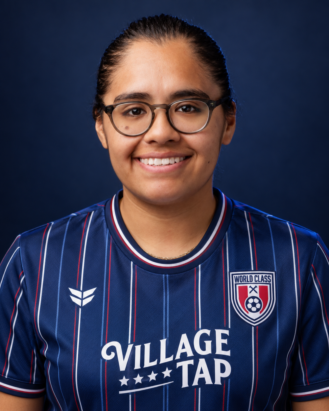 Esme Torres wearing the World Class FC home kit
